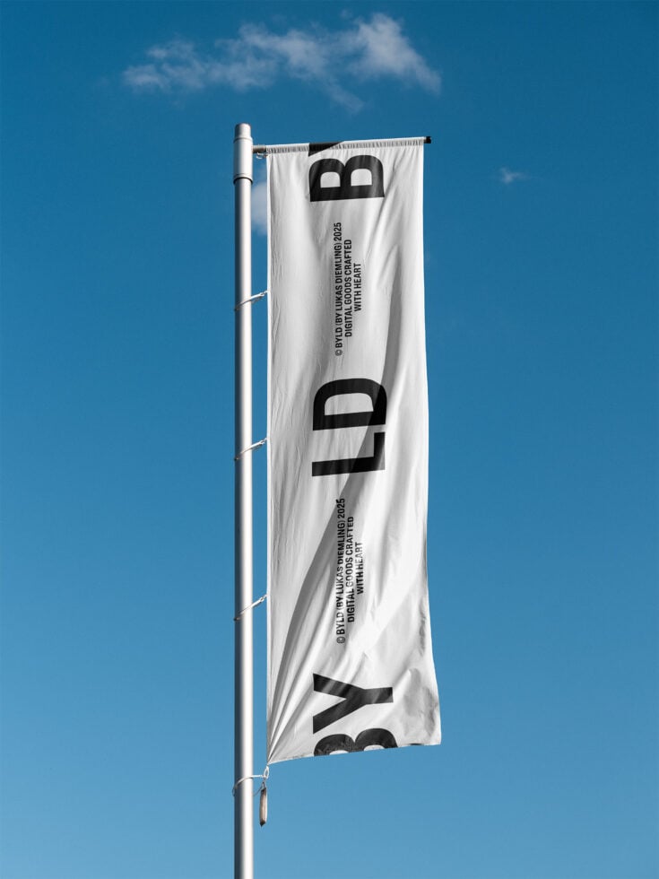 White horizontal banner flag with black bold letters, mounted on metal pole against blue sky