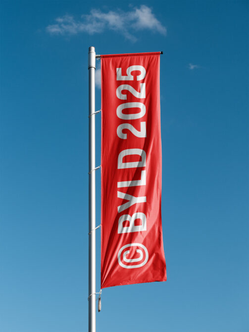 Red horizontal banner flag with white numbers, mounted on metal pole against cloudy sky