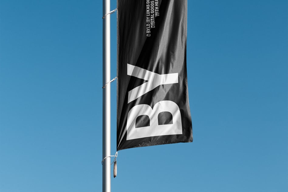 Dark grey banner flag with white logo symbol, digital goods credit text fluttering