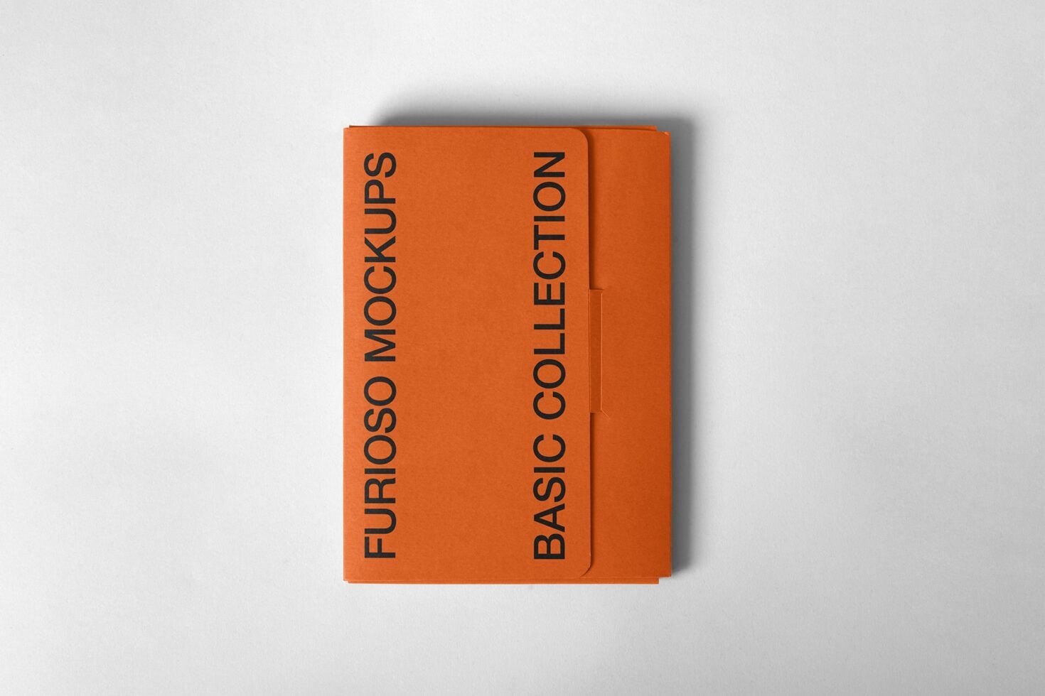 Orange notebook mockup closed on white background with soft shadow