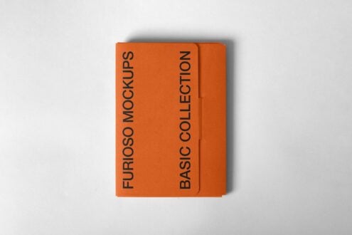 Orange notebook mockup closed on white background with soft shadow