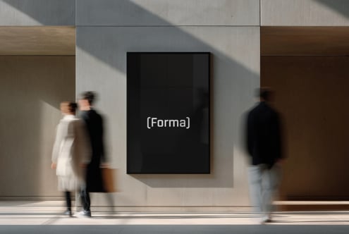 Black frame mockup on minimalist gallery wall with soft natural lighting