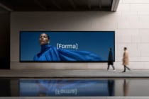 Woman in flowing blue fabric on large transit billboard displaying Forma branding