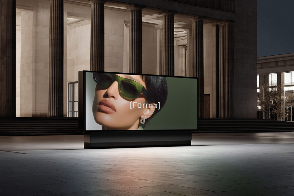 Indoor billboard display showing woman in green sunglasses with brand text overlay