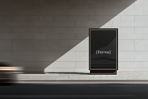 Minimalist billboard frame mockup with black screen, tile wall, bright natural light casting shadows