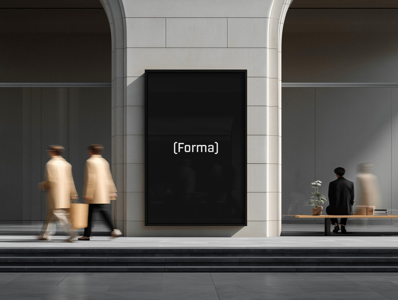 Black framed poster on white tile wall with blurred people walking by in modern lobby