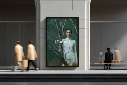 Framed image of woman holding bare branches against rich green backdrop on wall