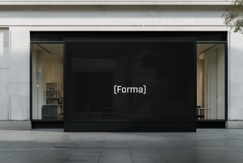 Interior corridor display showing minimalist text logo on dark screen