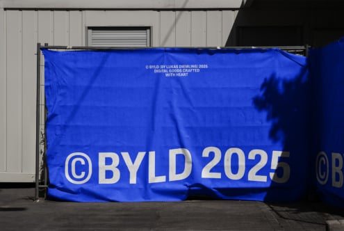 Electric blue banner with white copyright BYLD 2025 text displayed outside