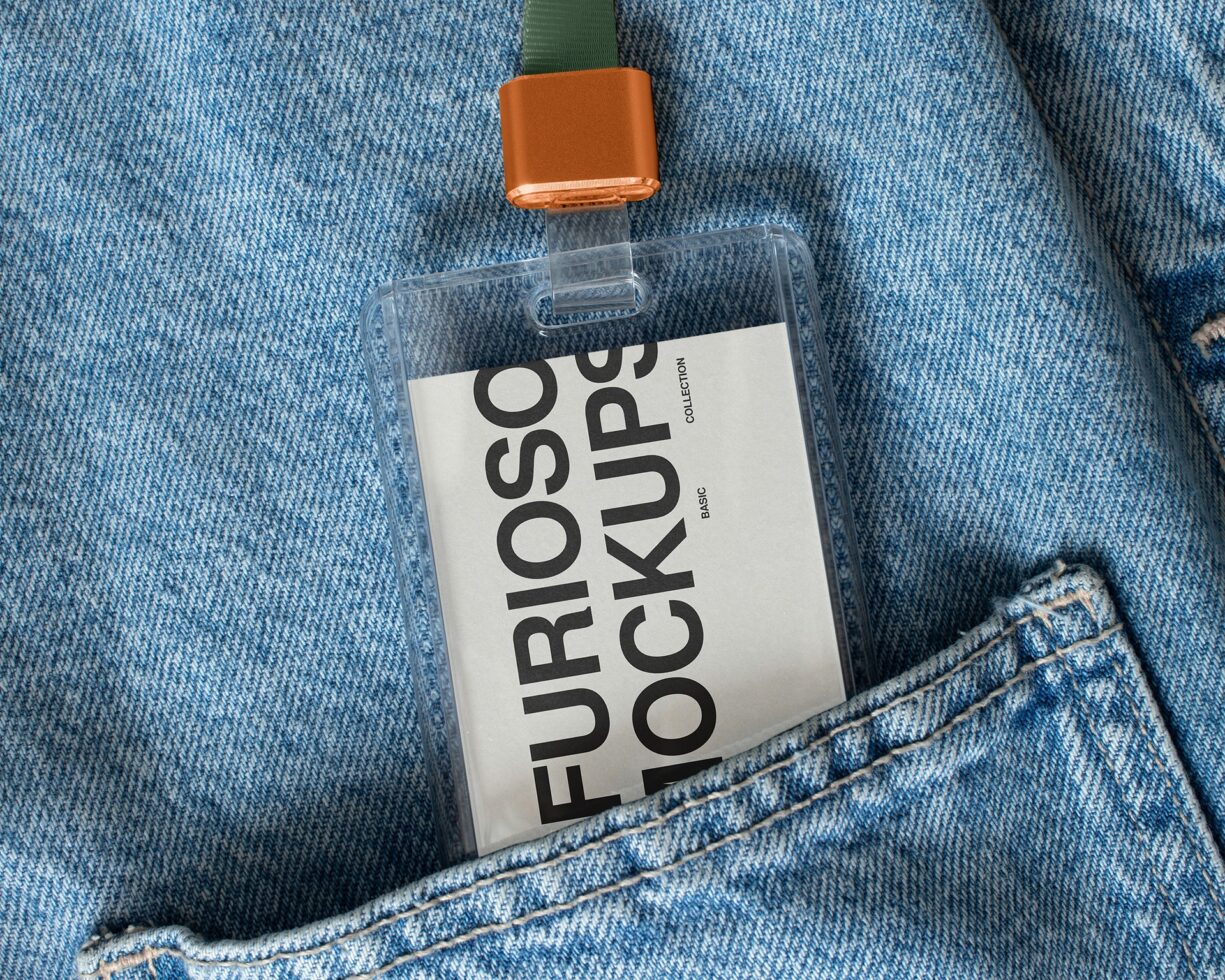ID badge on denim with green strap, orange clip, white label mockup