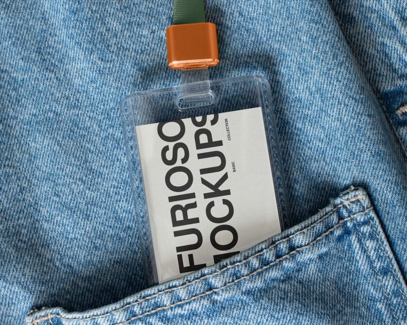 ID badge on denim with green strap, orange clip, white label mockup