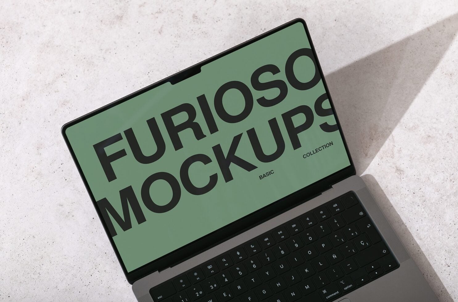 Laptop display in sage green with bold Furioso Mockups Basic Collection typography