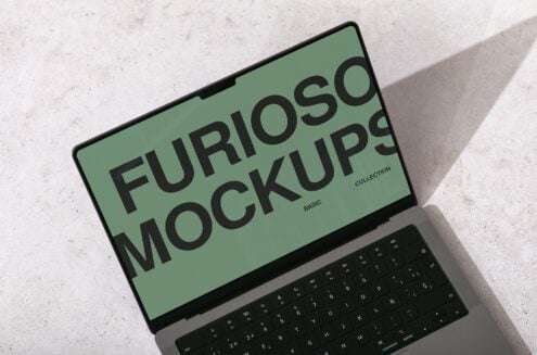 Laptop display in sage green with bold Furioso Mockups Basic Collection typography