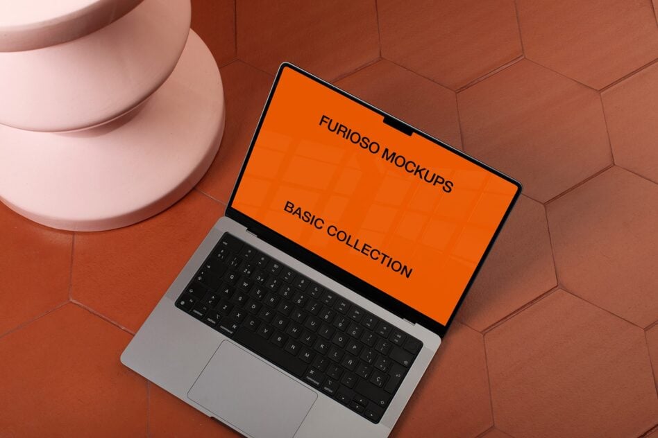 Open laptop with orange screen mockup on geometric tile background with pink object