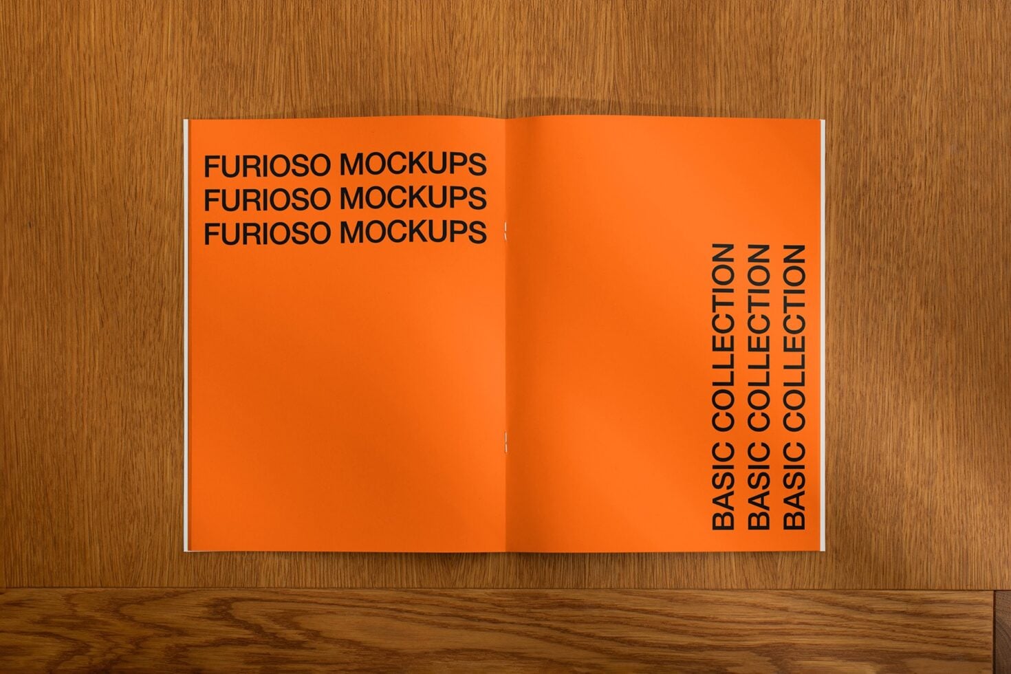Open orange magazine spread on wood with left page title text layout