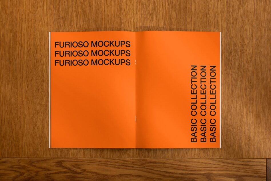 Open orange magazine spread on wood with left page title text layout