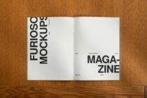 Open magazine spread showing left cover with vertical text right page blank