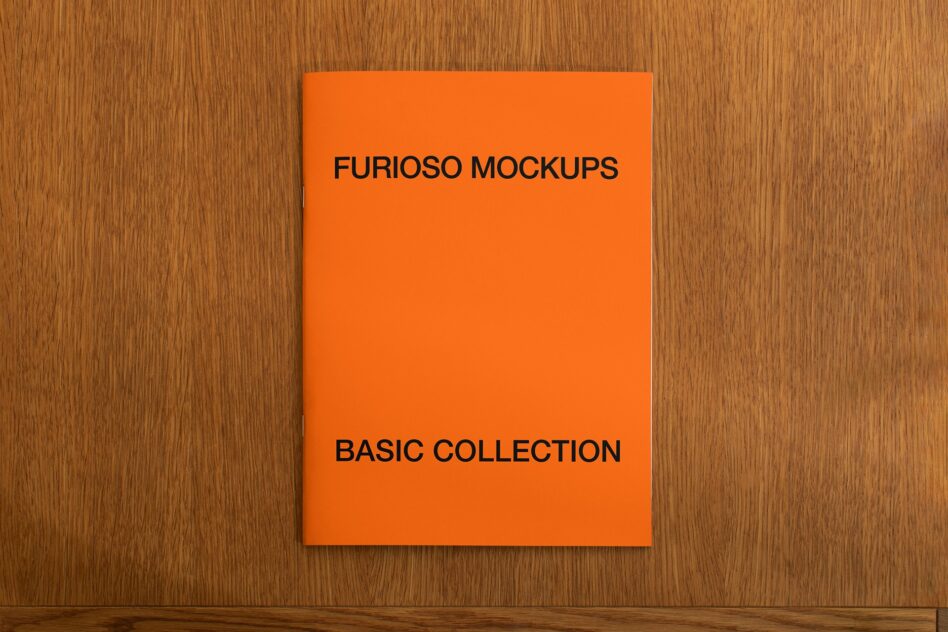 Bright orange square mockup on wooden surface showing basic collection branding