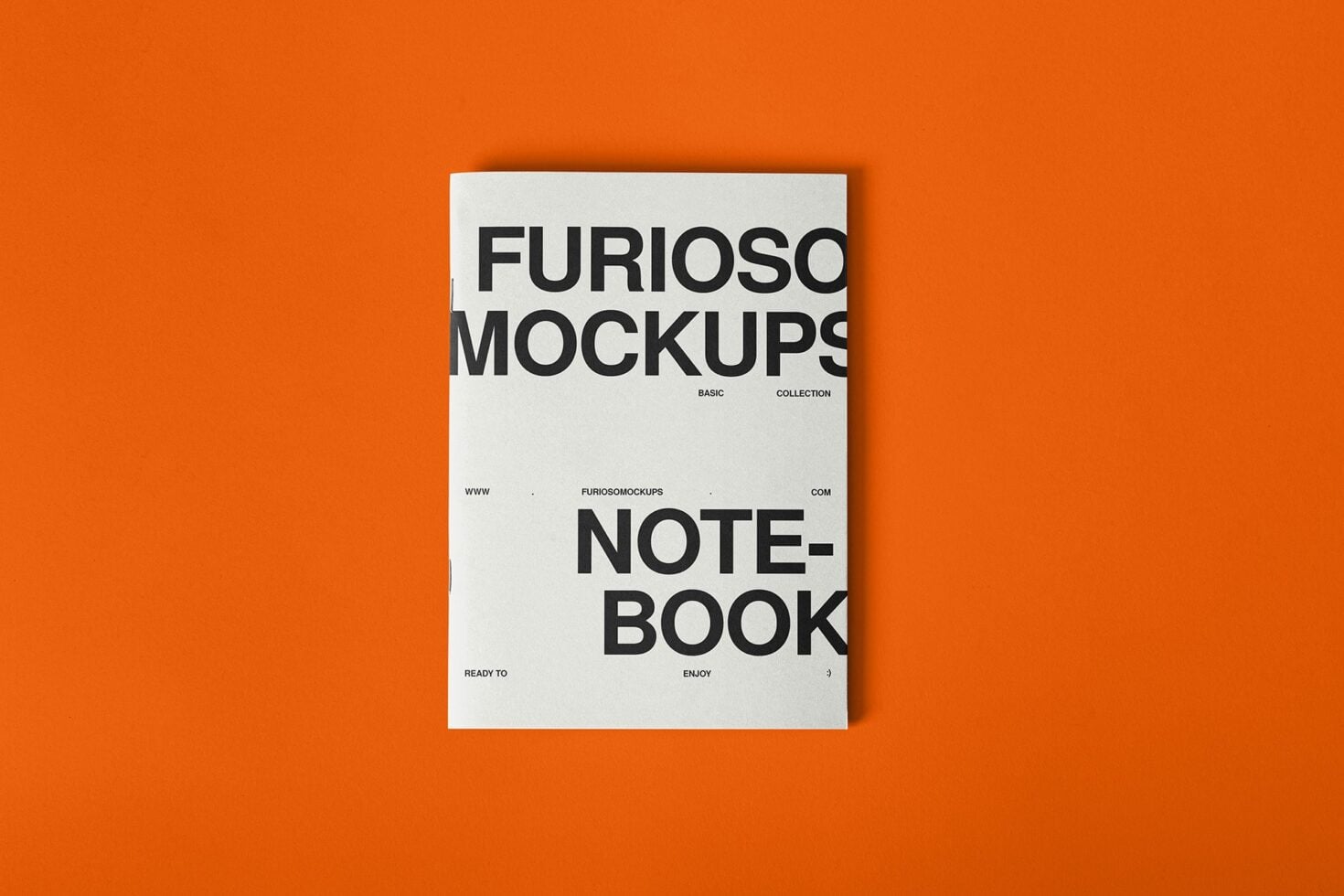 Notebook mockup with bold sans-serif typography on orange background