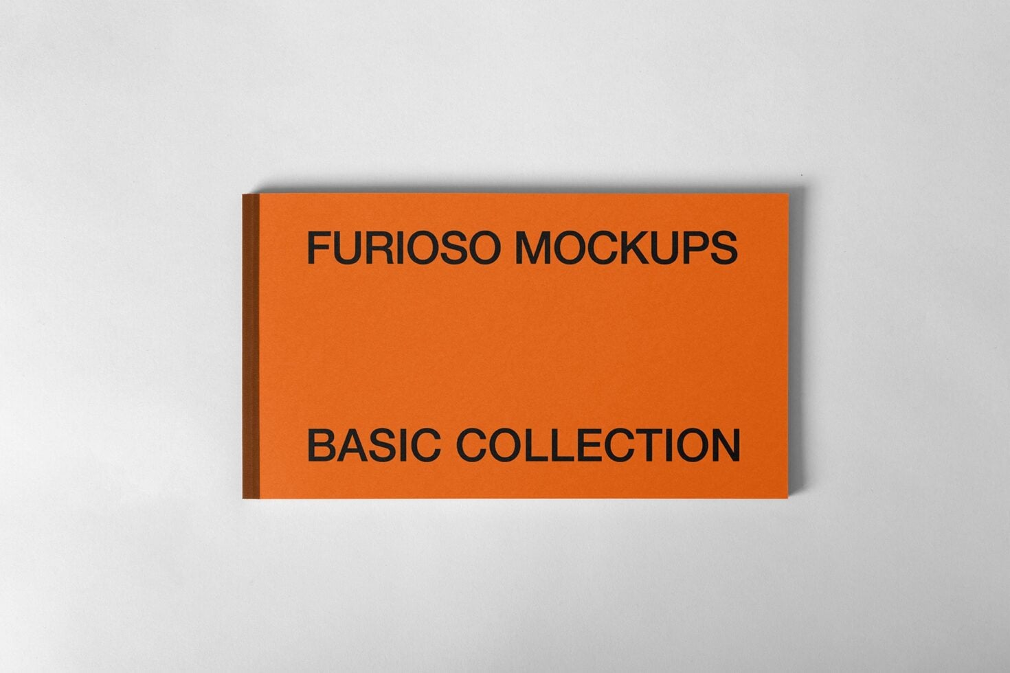 Bright orange hardcover book with dark text, shadow effect against white background