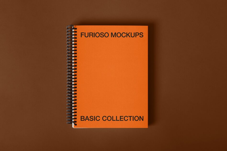 Orange spiral notebook cover mockup on brown background with minimal shadow