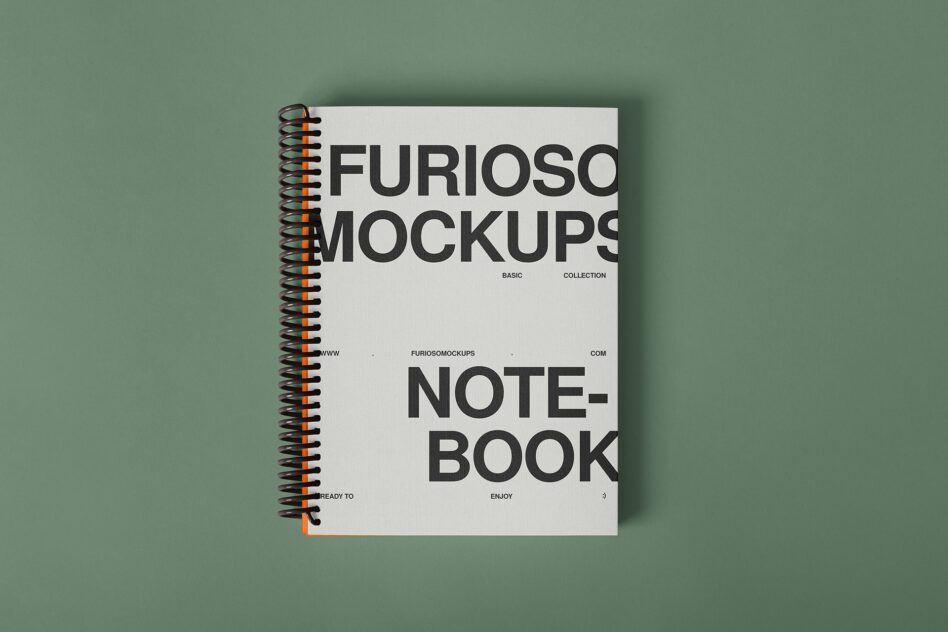 Spiral bound notebook mockup on sage green surface with organic shadow cast