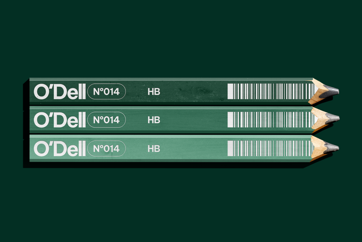 Three O'Dell HB pencils with green barrel lined up horizontally