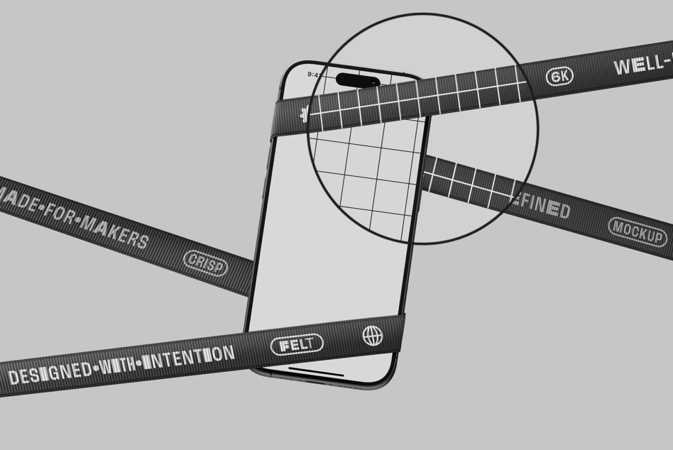 Phone mockup with grid overlay circle on screen surrounded by dark text ribbons