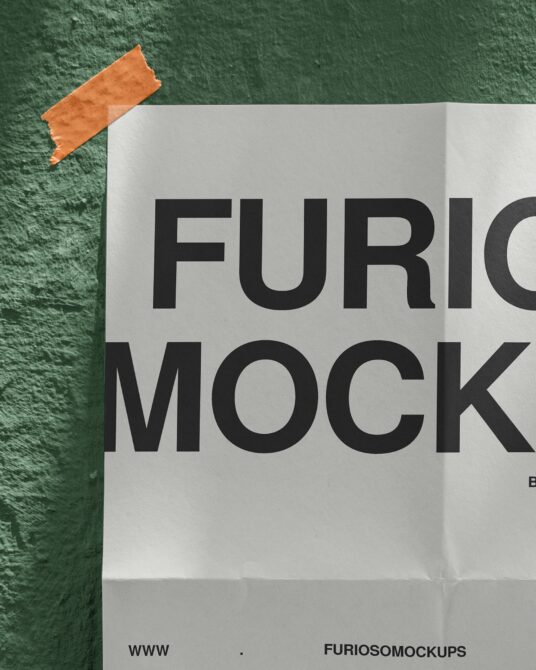 Folded poster mockup with orange tape on textured green wall