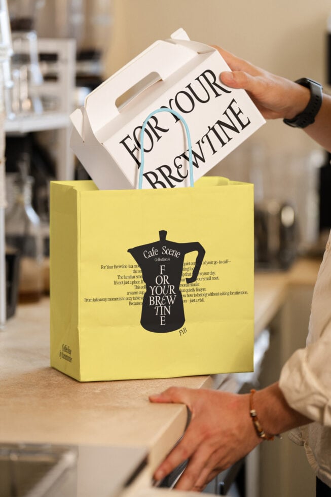 Yellow paper bag mockup with coffee cup inside, branded design