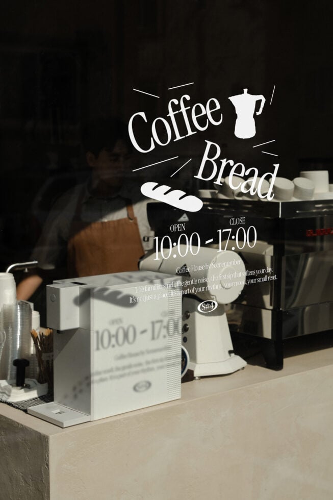 Cafe window decal mockup showing Coffee Bread text with times 10:00-17:00
