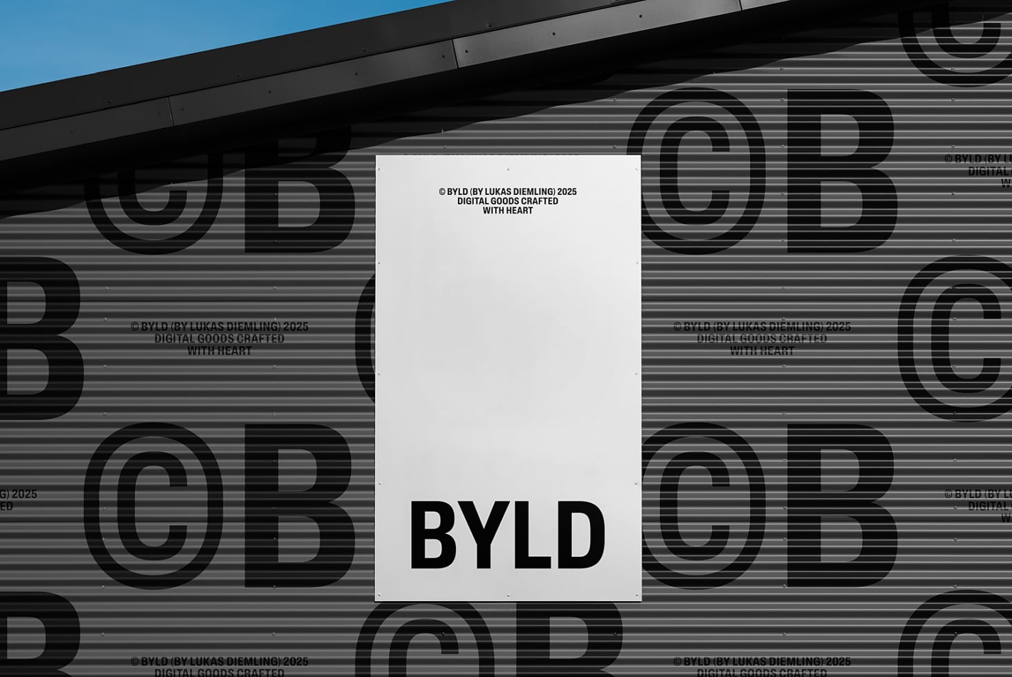 White poster with black BYLD text mounted on gray corrugated metal with large letters