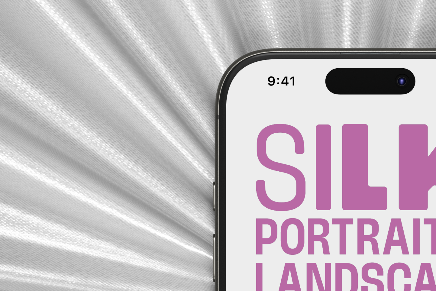 Phone closeup showing pink Silk text on white screen with textured background