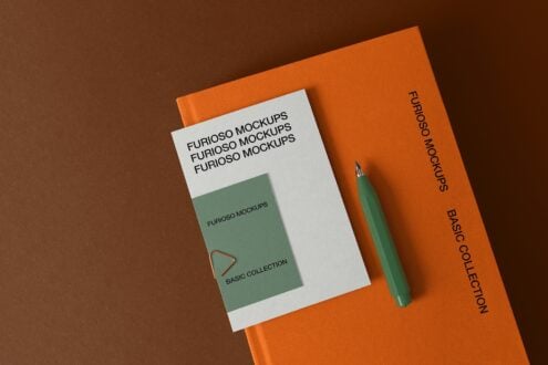 Orange folder with white mockup sheets layered inside, green pen on brown backdrop