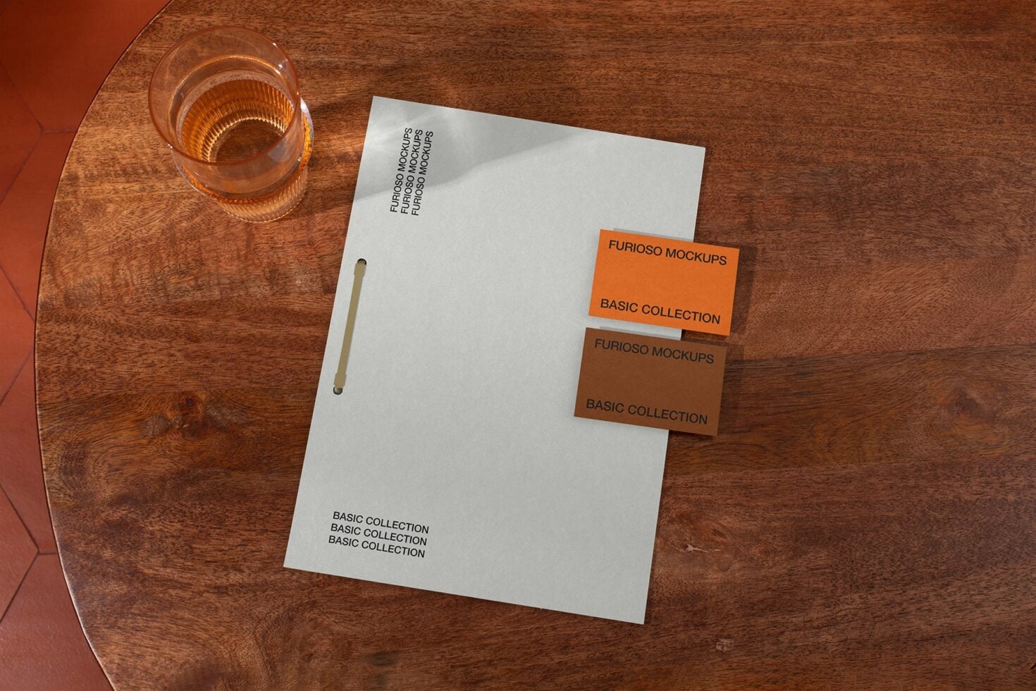 Letterhead mockup with business cards in orange brown on wooden table flat lay