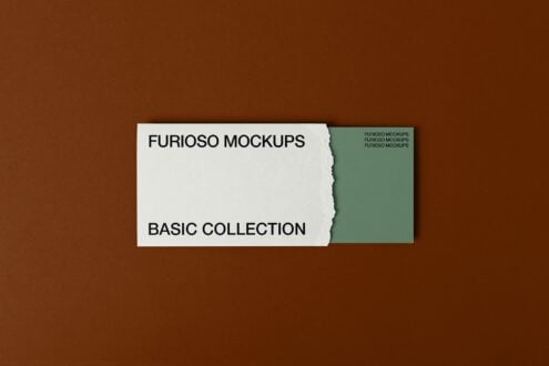 Torn white card with black text next to sage green card on brown backdrop