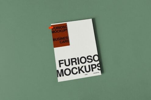 White business card mockup with small orange label on green background
