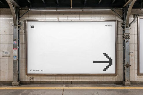White subway advertisement with minimal arrow icon, Colortime Lab branding below