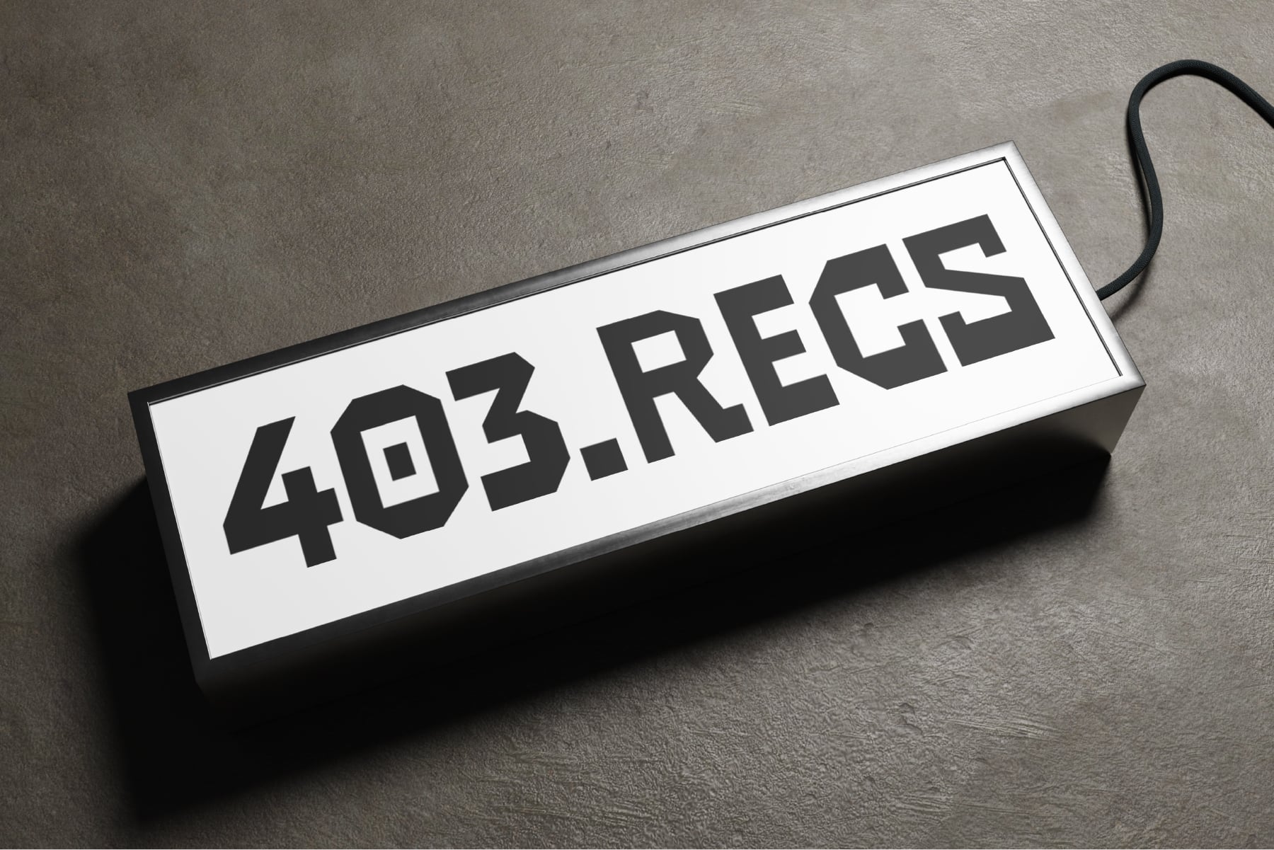 Illuminated nameplate sign displaying 403 Regs text module