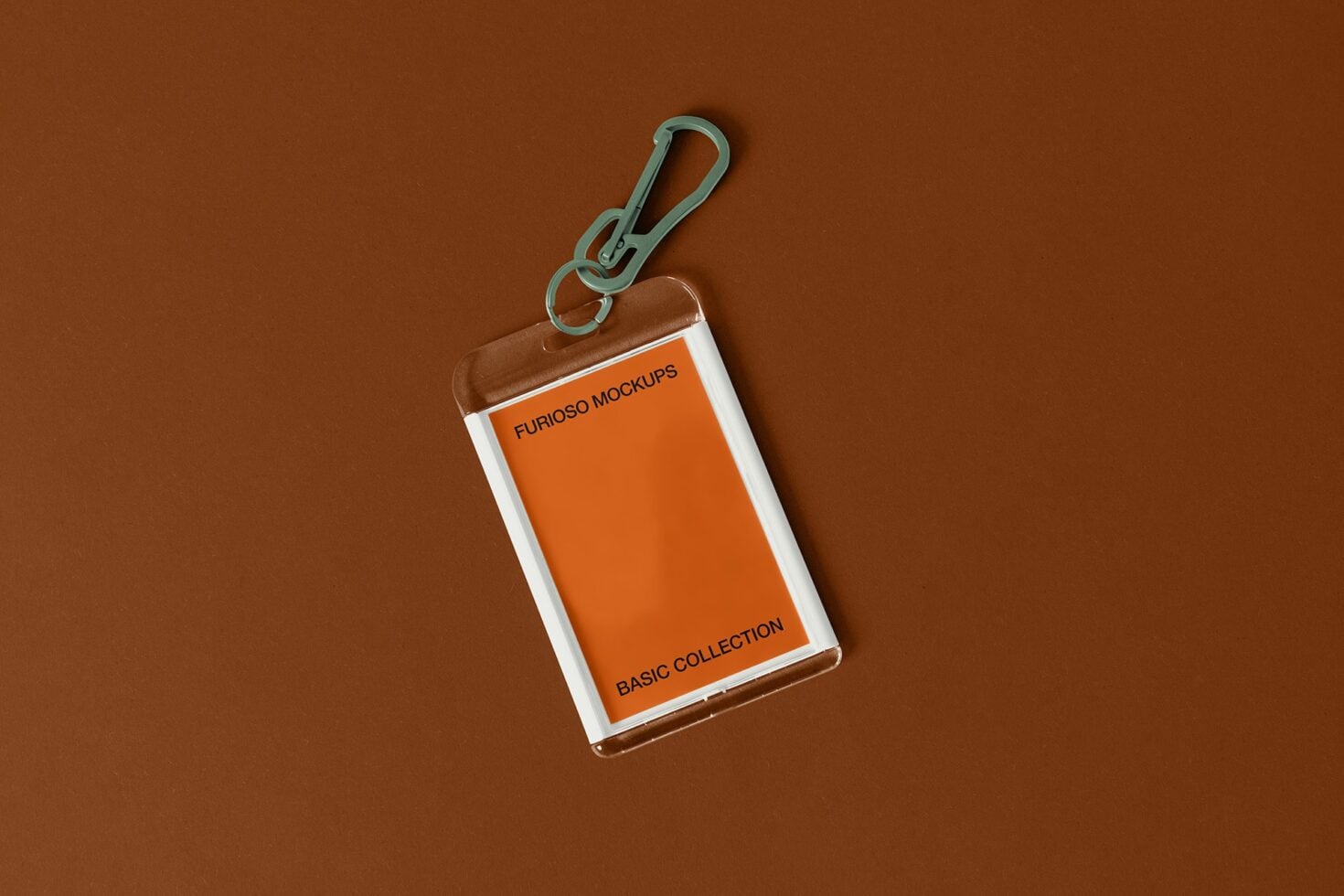 White-framed card holder with mint carabiner clip against warm brown textured surface