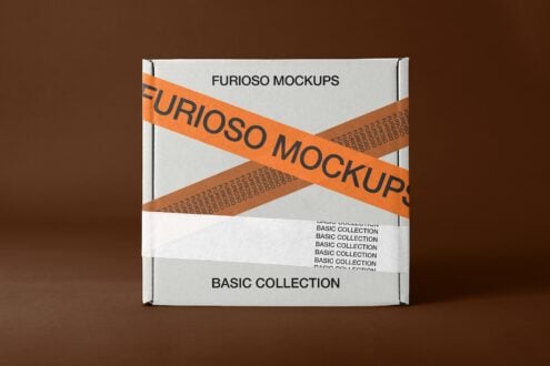 White box mockup with orange tape crossing it against warm brown background