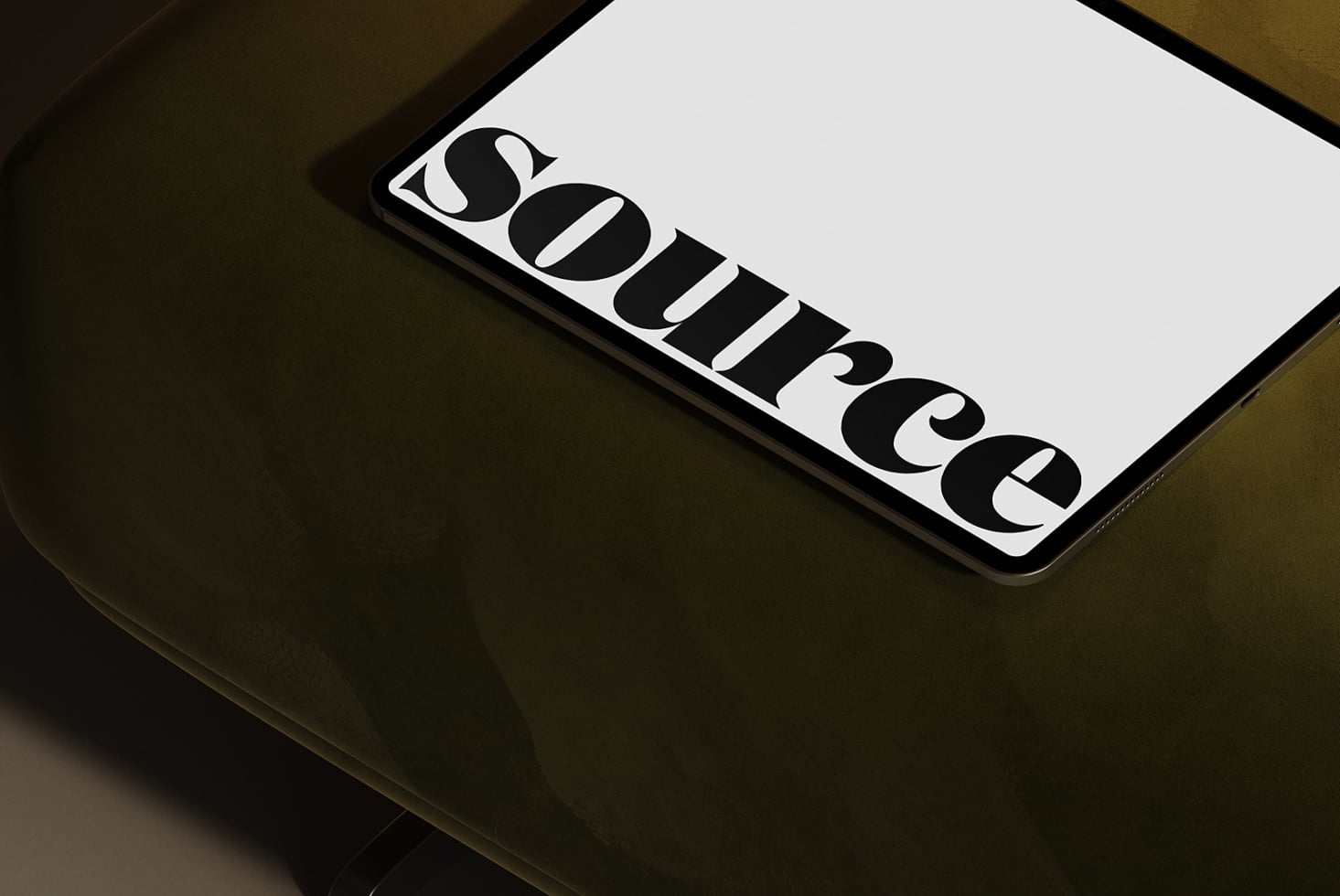 Smartphone screen showing geometric logo design on white surface tilted view