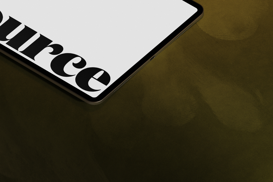 Mobile device corner showing partial serif typography in close-up