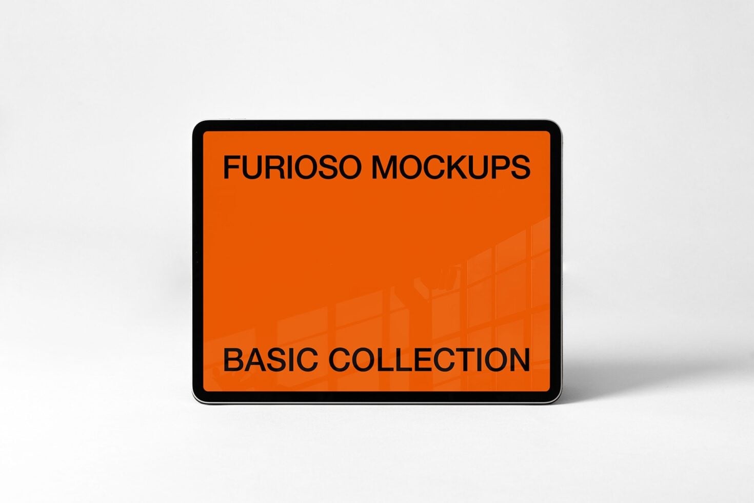Orange tablet mockup with black border displaying design text in landscape orientation
