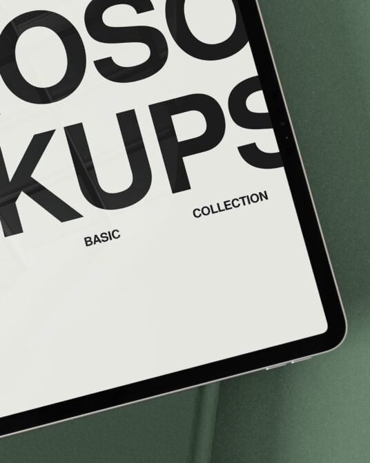 iPad close-up showing bold black typography on white screen