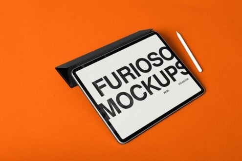 Tablet on orange background showing white screen with bold black typography