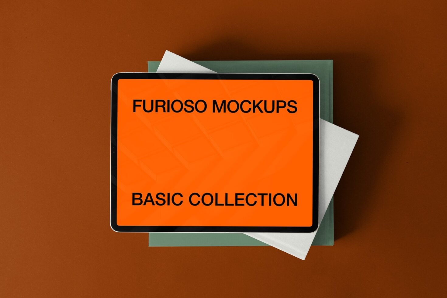 Tablet mockup on brown background surrounded by orange, white, green paper samples
