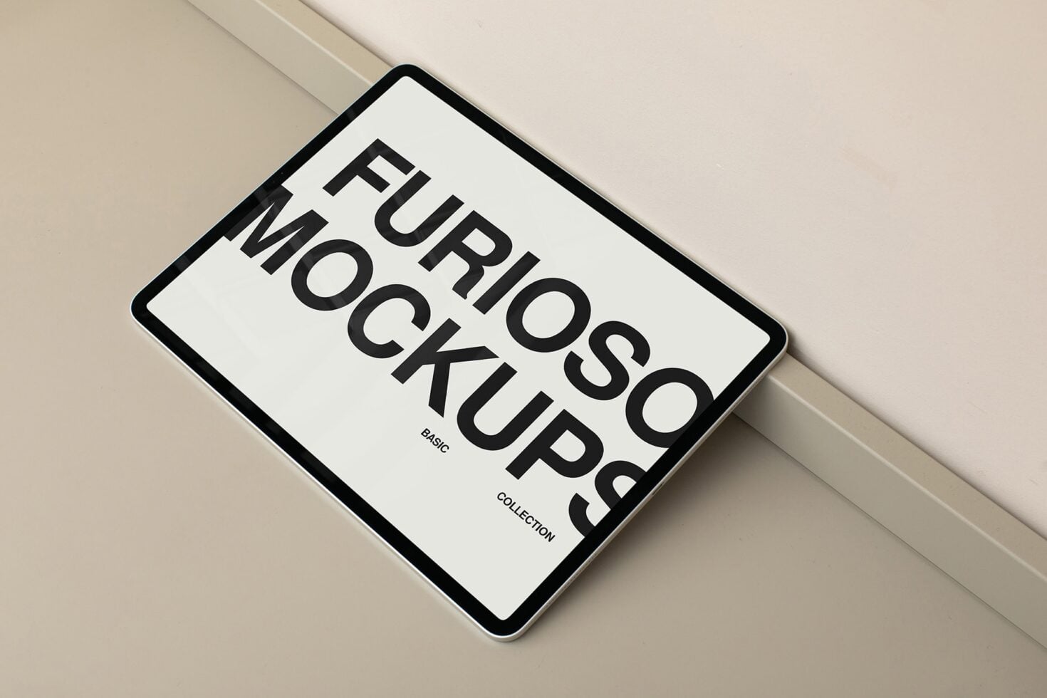 Tablet mockup with black border displaying Furioso Mockups Basic Collection text