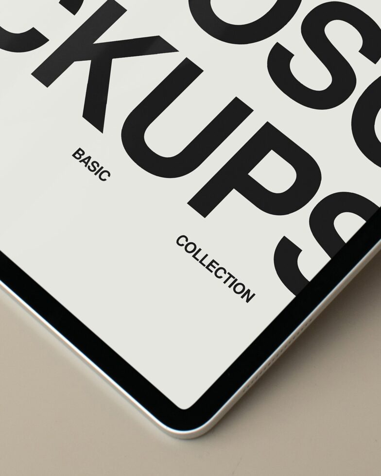 iPhone displaying cream screen with bold black letters cutoff at edges