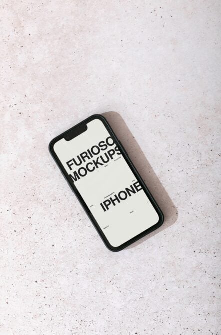 iPhone mockup with cream screen displaying black text on speckled surface